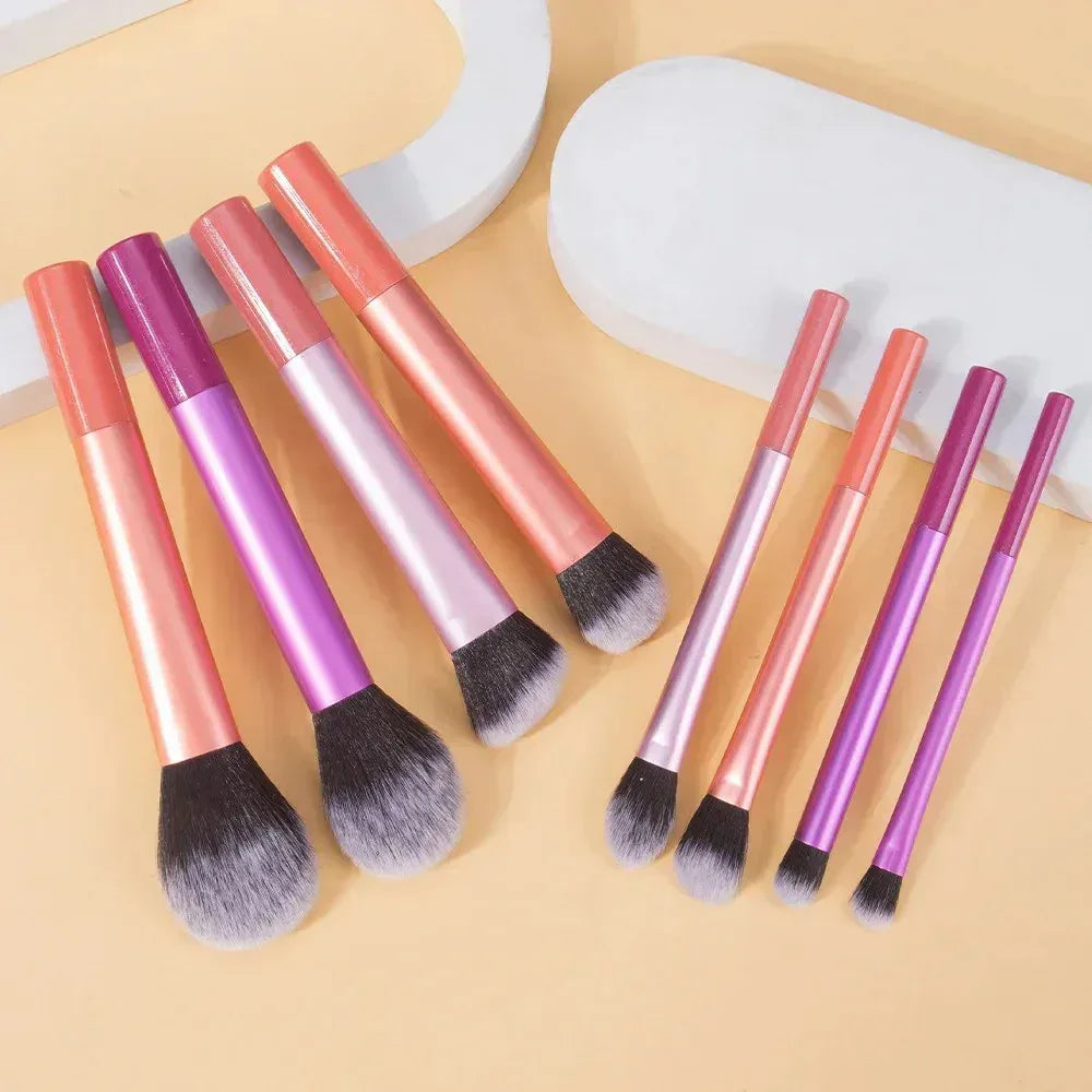 Makeup Brush Set featuring eight brushes with pink and purple handles for flawless application.