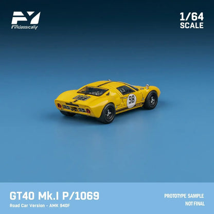 GT40 Mk.I P/1069 in bright yellow, 1/64 scale model car with racing decals.